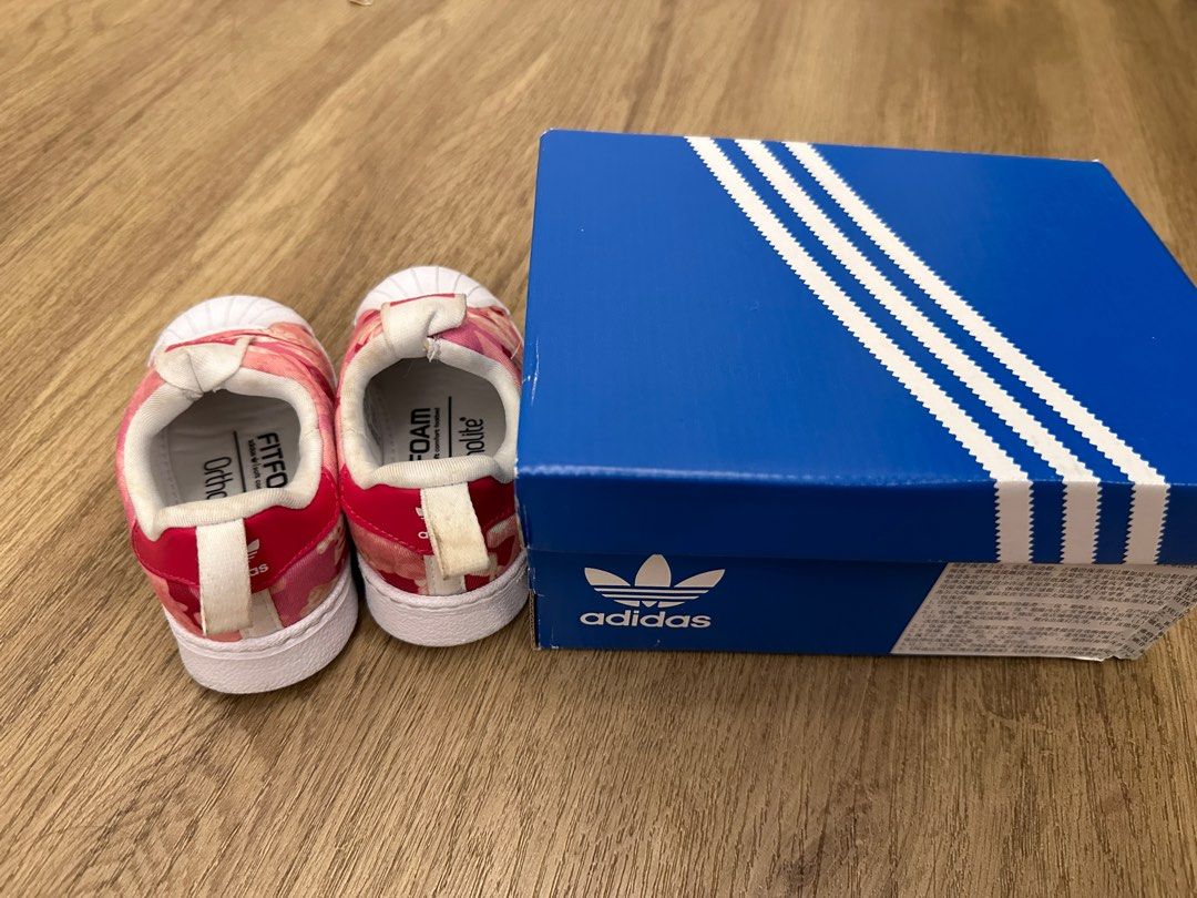 Red adidas baby shoes top