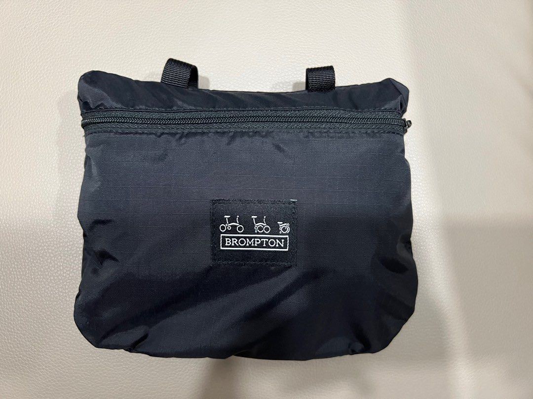 Brompton bike cover with integrated sales pouch