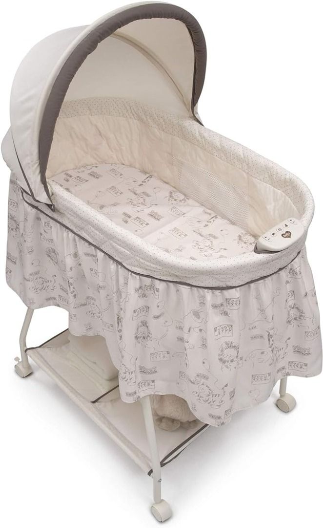 Delta children's playtime jungle rocking bassinet best sale