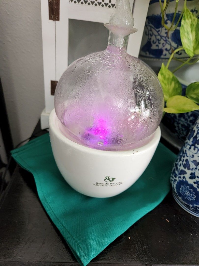 Diffuser (Category: Home Fragrance) located in Singapore. Submitted by ashket20 (Listing ID 1274647812, Image 3). Description: Beautiful Aromatherapy. Barn & Potter. with lights ($25 GLass) White diiffuser lights up aso when in use ($25).