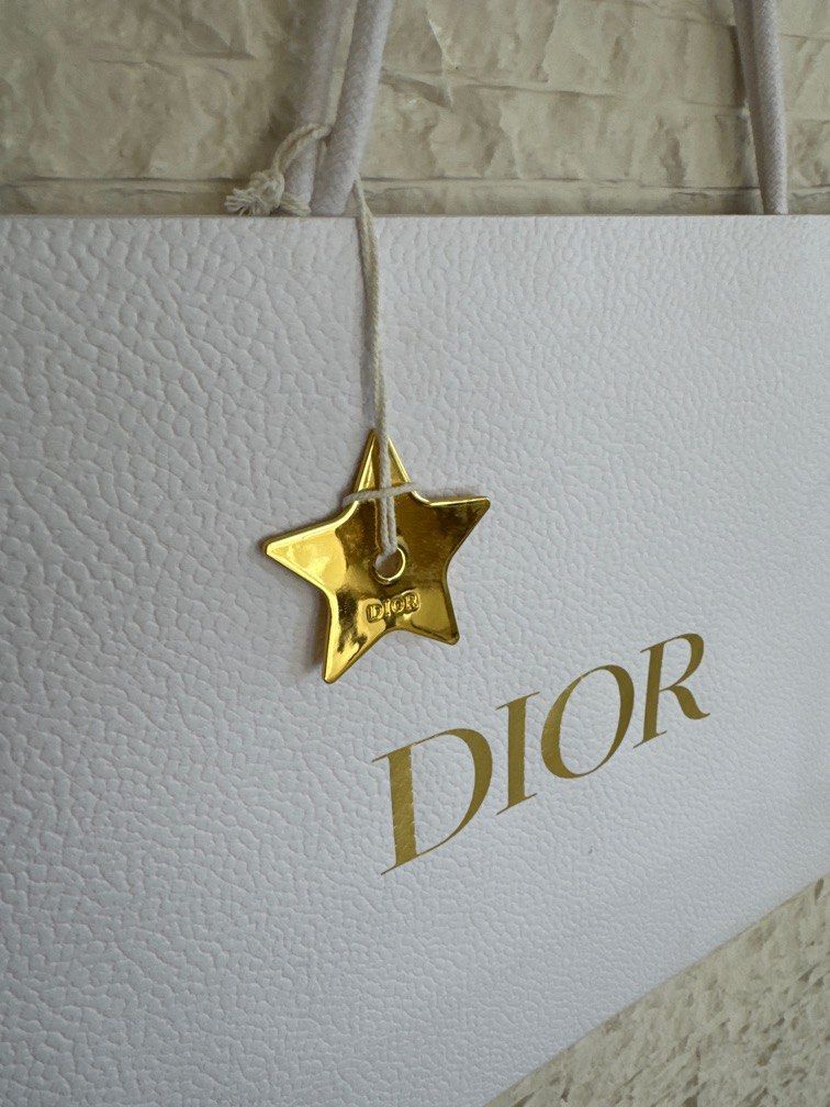 Dior Paperbag with Dior Star Charm Medium (Category: Luxury Accessories) located in San Fernando. Submitted by mnlt_o (Listing ID 1275464961, Image 2). Description: Authentic From Dior, Paris See photos for condition OAD: 30 L x 42 W x 13 D cm Price: 1,800 + 250 shipping Location: San Fdo Pamp..
