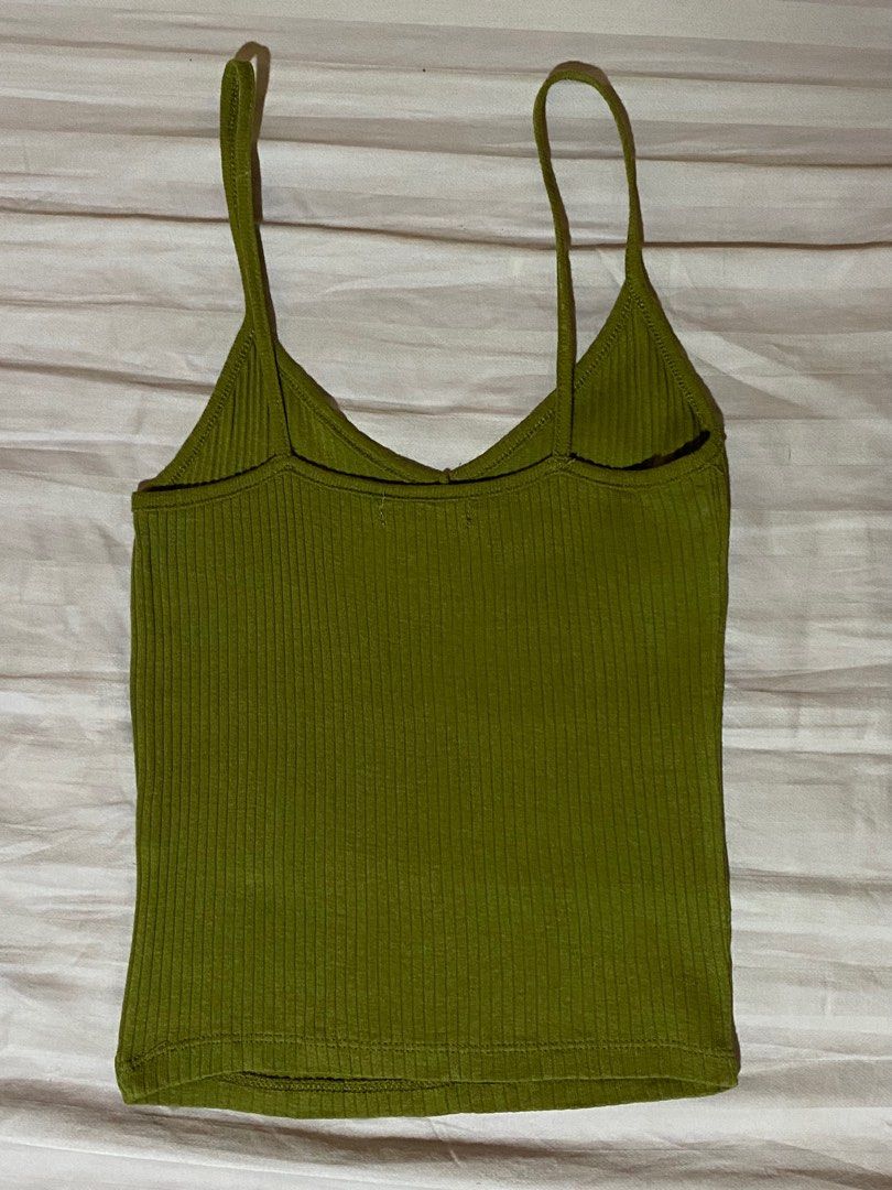 Moss Green Ribbed Cami Top (Category: Sleeveless) located in Marikina City. Submitted by msgdptrp (Listing ID 1275585833, Image 2). Description: ‼️ AVAILABLE, ON-HAND ‼️ ‼️ LAST PRICE POSTED ‼️ – moss green ribbed sleeveless cami top, approximately fits SMALL to MEDIUM (fabric is stretchy) – brand new without tag, never worn but washed – NO WHEN WORN – measurements (laid flat, allow 0.5 to 1" allowance): > bust: 10 3/4" > length: 18" – issue: bra