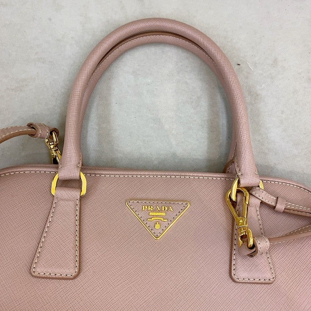 Baby pink deals prada bag