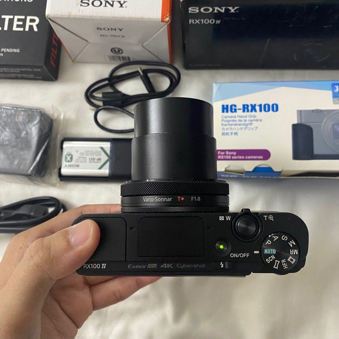 Sony RX100 IV (M4) Cybershot + extras, Photography, Cameras on Carousell