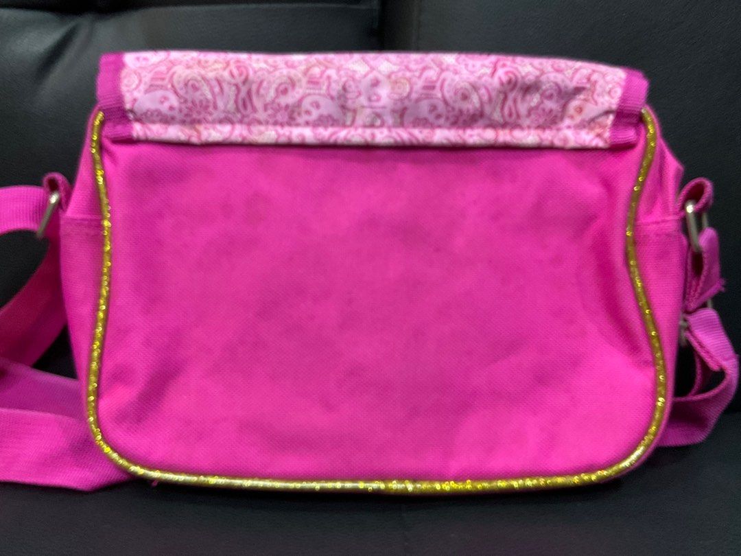 Barbie Princess Rock Messenger Bag (Category: Shoulder Bags) located in San Juan City. Submitted by shopperssouk (Listing ID 1269429852, Image 2). Description: Barbie Princess Rock Messenger Bag •With 1 main compartment and flap velcro cover. 3D front design. • Used - like new. ————————————————————— What you see is what you get. Our items are like new and rarely used. Actual pictures posted. 🛍 For other affordable authentic items, kindly visit o