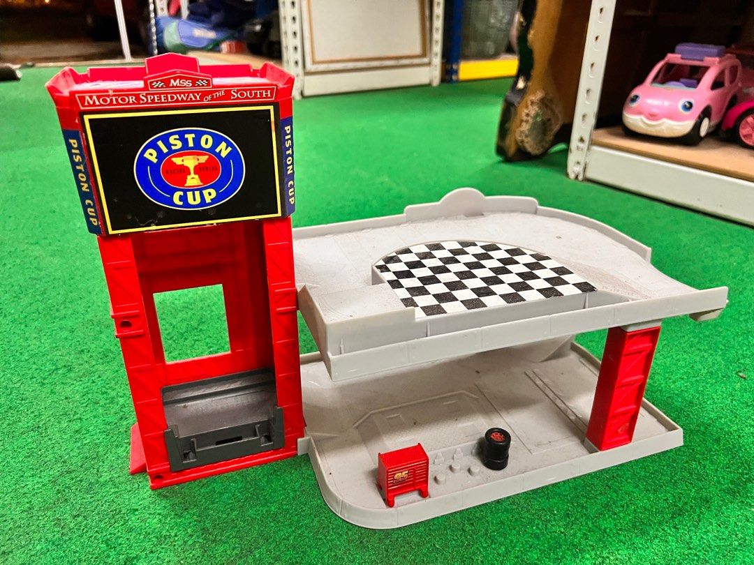 Cars garage piston top cup