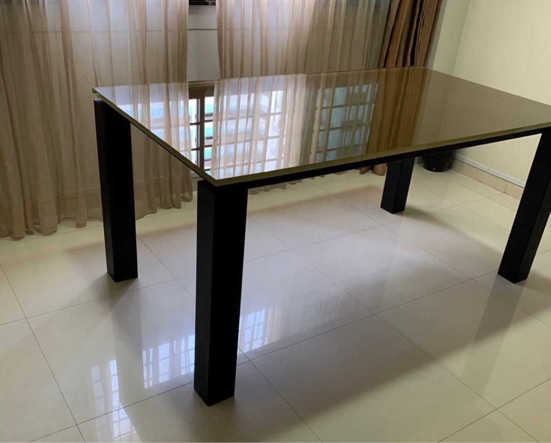 Dining Table (Category: Tables & Sets) located in Singapore. Submitted by greencart (Listing ID 1269345609, Image 2). Description: Neat look Glass Top Solid Frame Place comfortably six chairs You can opt to change the colour of the glass .
