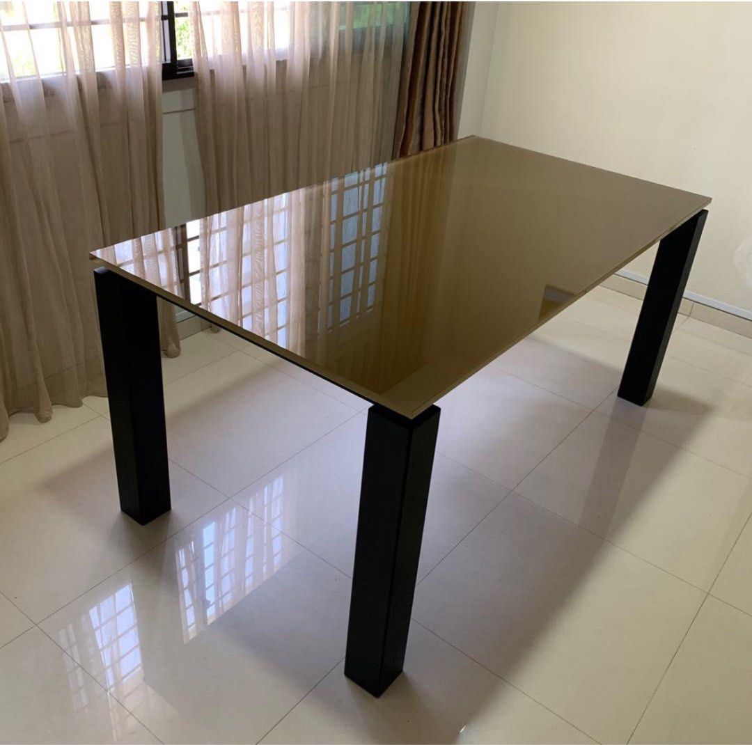 Dining Table (Category: Tables & Sets) located in Singapore. Submitted by greencart (Listing ID 1269345609, Image 3). Description: Neat look Glass Top Solid Frame Place comfortably six chairs You can opt to change the colour of the glass .
