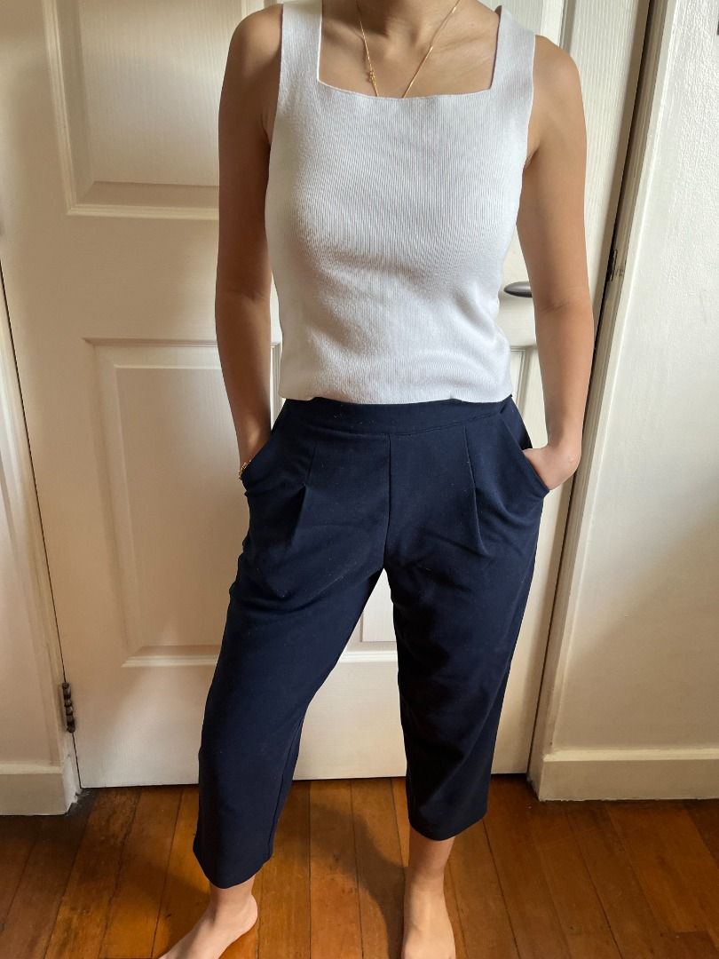 Forever21 Dark Blue Cropped Trousers (Category: Other Bottoms) located in Pasig City. Submitted by declutter.jr (Listing ID 1269329383, Image 2). Description: Zipper functional but may be difficult to slide up Model's measurements: Shoulder to shoulder 16 inches Chest 31 inches Waist 25 inches Hips 34 inches Height 5’3.