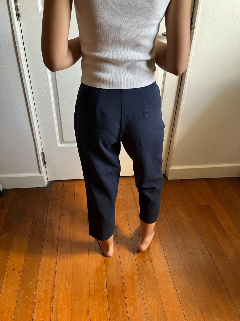 Forever21 Dark Blue Cropped Trousers (Category: Other Bottoms) located in Pasig City. Submitted by declutter.jr (Listing ID 1269329383, Image 3). Description: Zipper functional but may be difficult to slide up Model's measurements: Shoulder to shoulder 16 inches Chest 31 inches Waist 25 inches Hips 34 inches Height 5’3.
