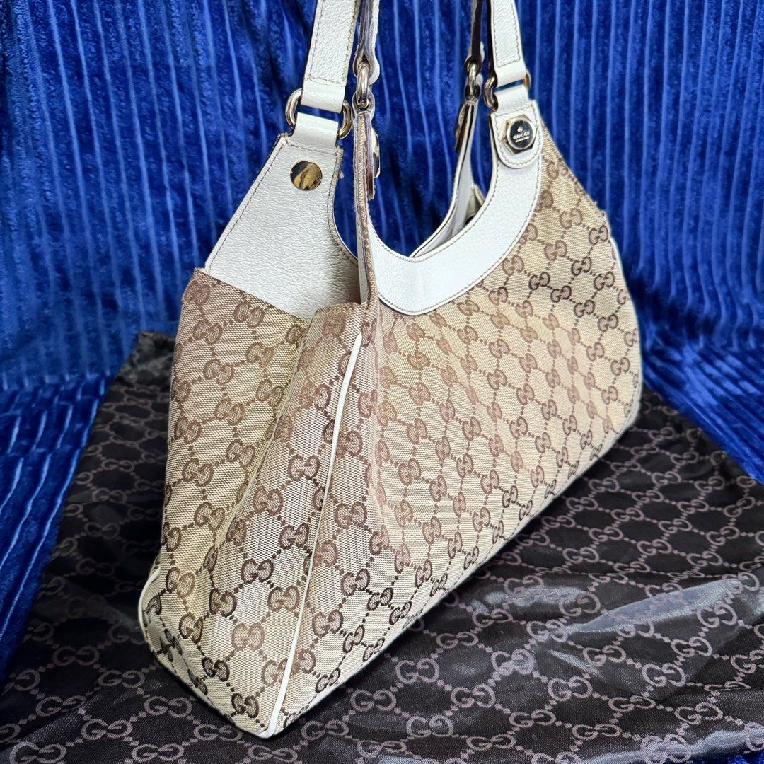Gucci White Charmy Monogram bag medium (Category: Luxury Bags & Wallets) located in Imus. Submitted by leslian.era (Listing ID 1269287694, Image 3). Description: RUSH SALE PRELOVED 💯 Gucci White Charmy Monogram bag medium 100% authentic comes with dustbag Perfect as gift or pang-awra No cracks, no rubs, clean interior, no smell Condition: 9/10 W 36cm x H 20cm x D 7.5cm SF/ Lalamove/LBC/Grab shouldered by buyer Location: Imus, Cavite .