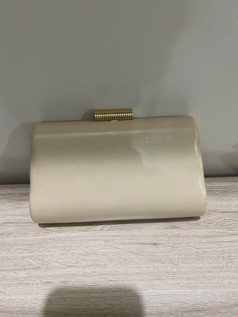 Mango Beige evening bag (Category: Clutches) located in Makati City. Submitted by _wardrobecleanse (Listing ID 1269403425, Image 2). Description: Bought for 3K selling low because the strap is broken but works perfectly as a clutch .