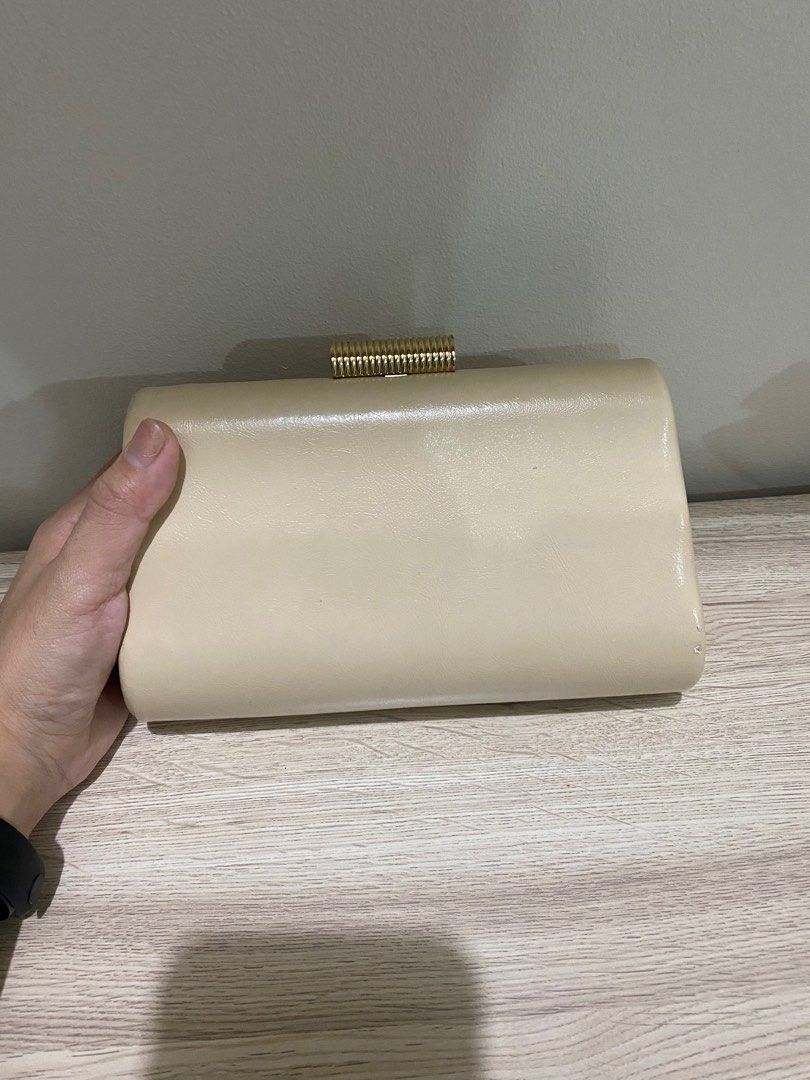 Mango Beige evening bag (Category: Clutches) located in Makati City. Submitted by _wardrobecleanse (Listing ID 1269403425, Image 1). Description: Bought for 3K selling low because the strap is broken but works perfectly as a clutch .