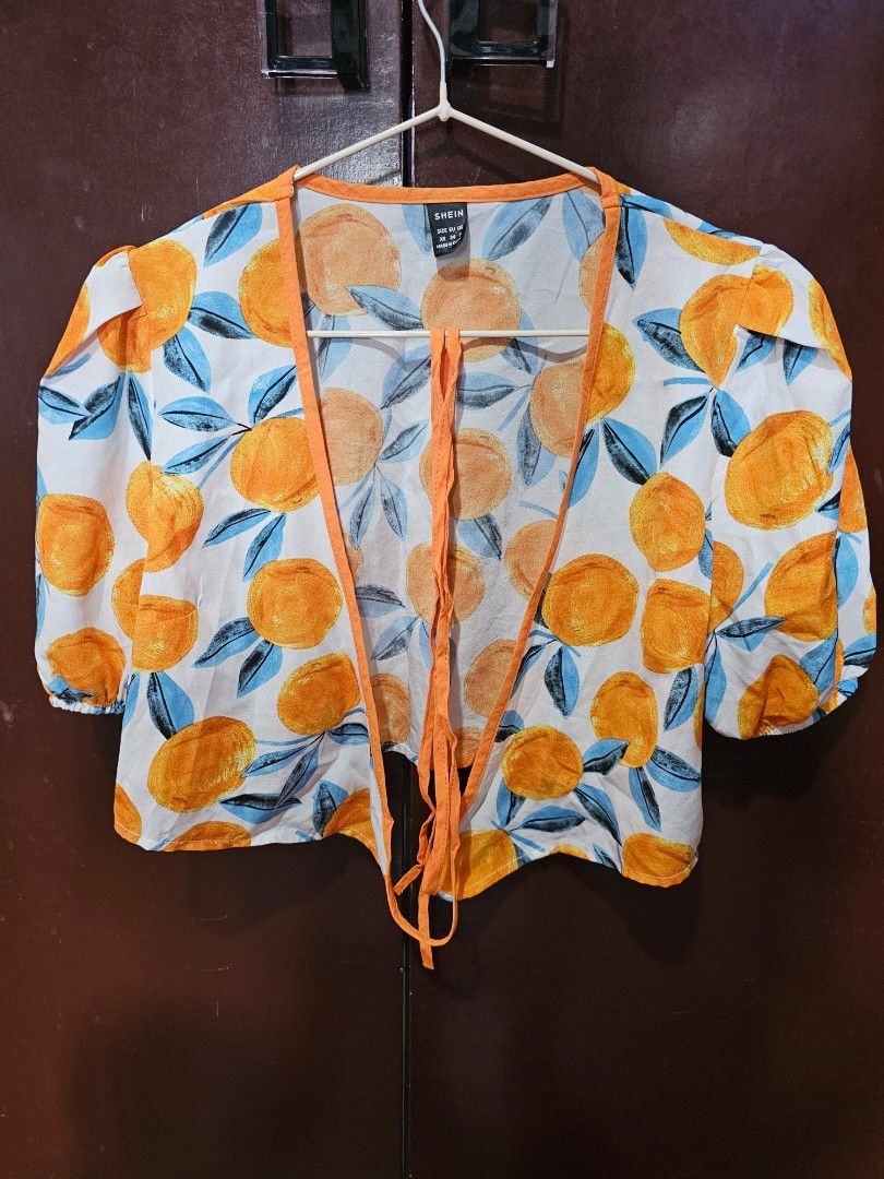 Orange crop top (Category: Blouses) located in Bacoor. Submitted by marshmallow2020 (Listing ID 1269307713, Image 3). Description: Bought it here in carousell and used it twice only. RFS: decluttering.