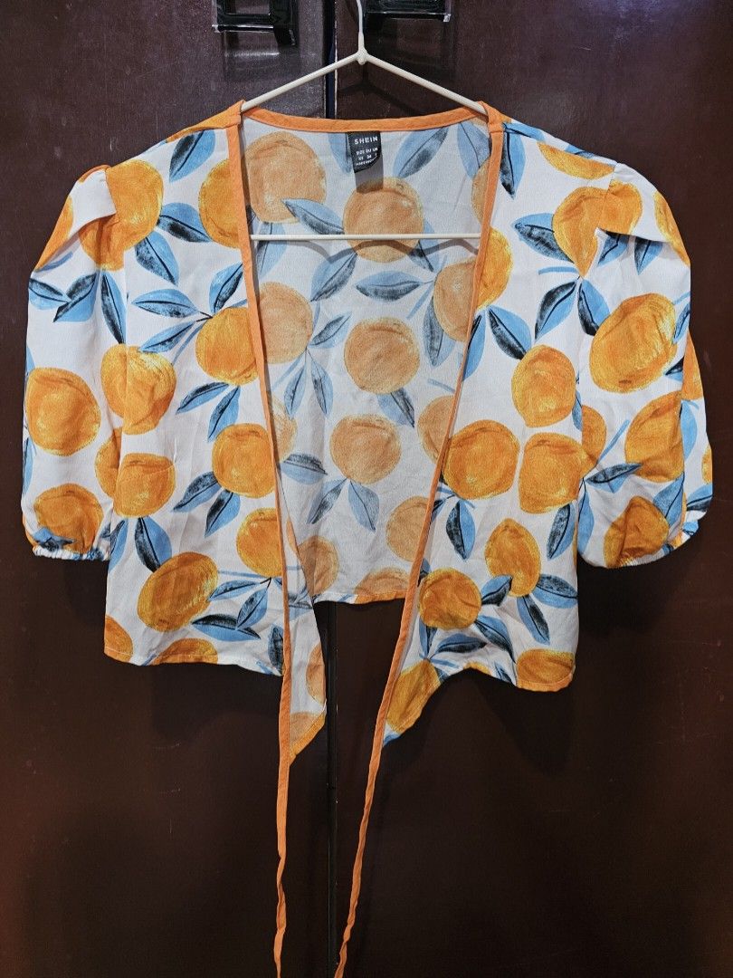 Orange crop top (Category: Blouses) located in Bacoor. Submitted by marshmallow2020 (Listing ID 1269307713, Image 2). Description: Bought it here in carousell and used it twice only. RFS: decluttering.