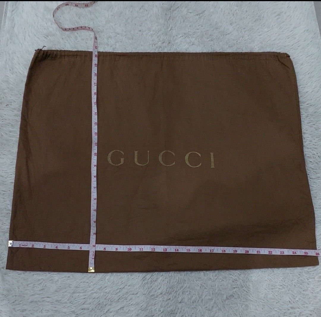 Authentic Gucci Dust bag 20.5x26 inches (Category: Luxury Bags & Wallets) located in Manila. Submitted by jfluxury.co (Listing ID 1269657355, Image 3). Description: excellent condition no flaws bought in Japan 🇯🇵 💯% Authentic. 😊 Money back guarantee. 😊 Clean and ready to use na po.