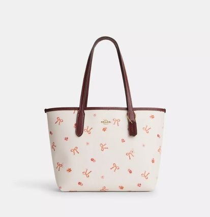 Coach handbag with bow online