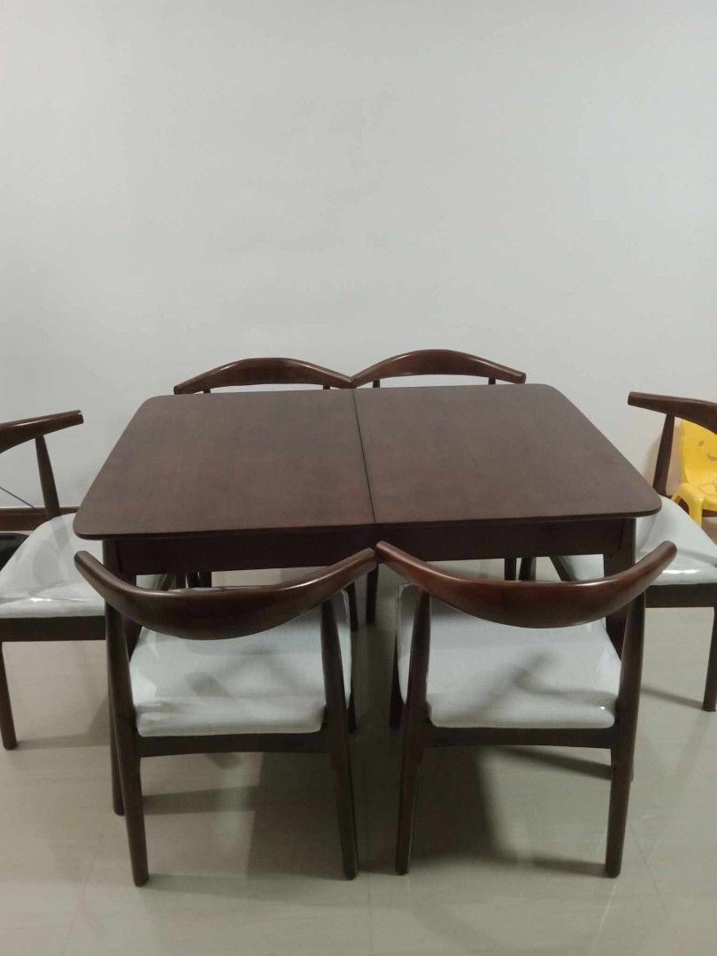 Expandable dining table (Category: Tables & Sets) located in Quezon City. Submitted by furniturefinds888 (Listing ID 1269488909, Image 1). Description: solid wood table 12,500 Chair 2,800 each .