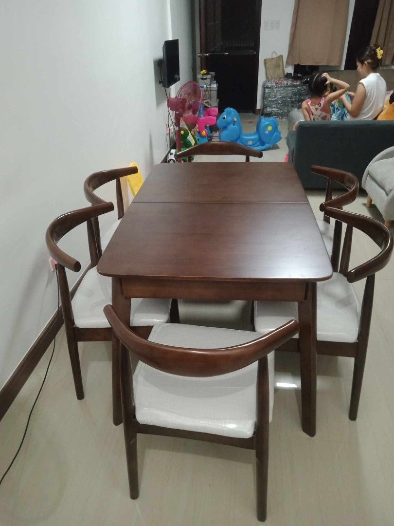 Expandable dining table (Category: Tables & Sets) located in Quezon City. Submitted by furniturefinds888 (Listing ID 1269488909, Image 2). Description: solid wood table 12,500 Chair 2,800 each .