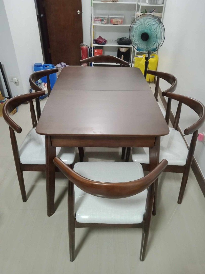 Expandable dining table (Category: Tables & Sets) located in Quezon City. Submitted by furniturefinds888 (Listing ID 1269488909, Image 3). Description: solid wood table 12,500 Chair 2,800 each .