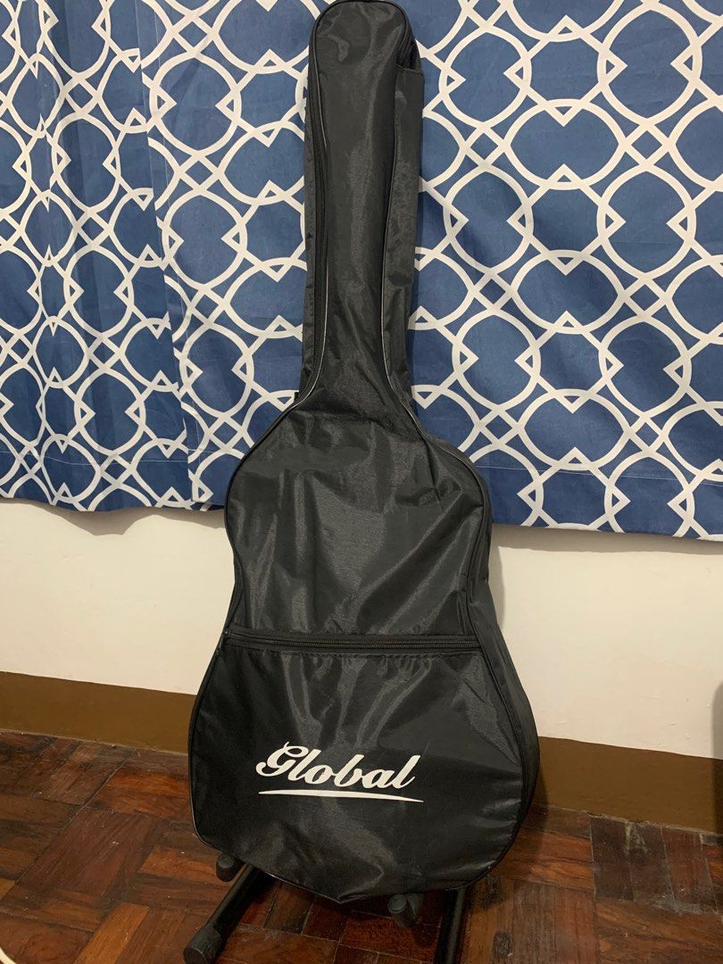 Global Guitar for beginners with free stand (Category: Musical Instruments) located in Manila. Submitted by dsn_md (Listing ID 1269702312, Image 3). Description: Issue lang is yung - Guitar case, it has flaws (sira ung zipper, may butas pero nalalagay pa rin yung case) With free strap, stand, pick, extra nylon strings Loc: manila, lalamove or pick up in my area.
