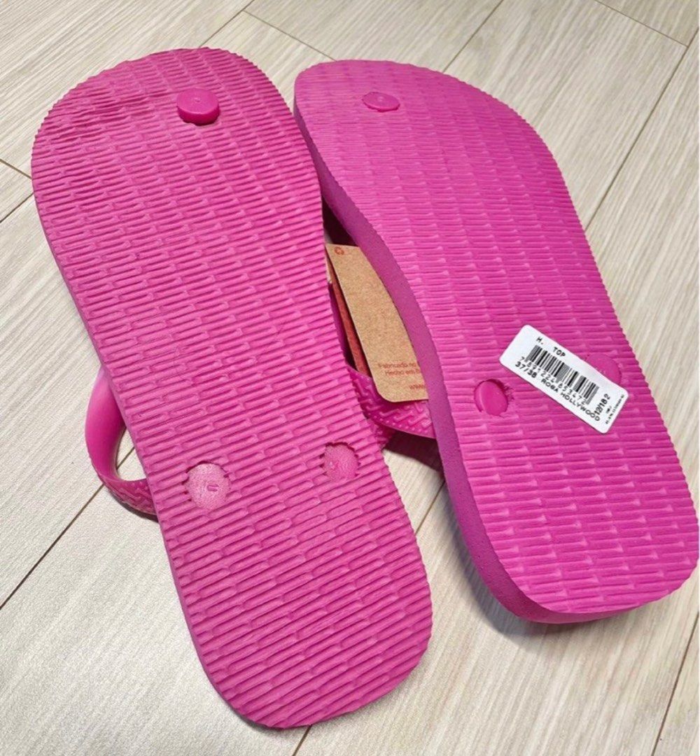Cheap pink flip flops top