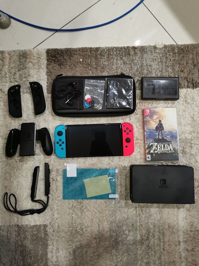 Nintendo Switch OLED FREE 40 PAID GAMES AND ACCESSORY BUNDLE