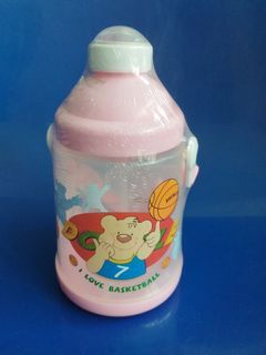 Pink water bottle with shoulder strap
