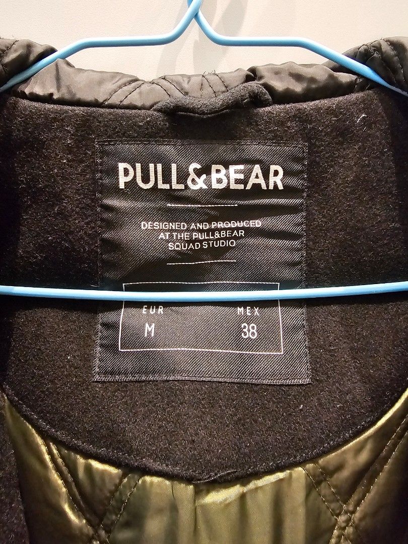 Pull & Bear winter jacket (Category: Coats, Jackets and Outerwear) located in Singapore. Submitted by ktanb (Listing ID 1269548714, Image 6). Description: Pull & Bear winter jacket. Size Eur M/Mex38. Made from 51% wool, rest of material as shown in picture. Jacket is in very good condition. Very well made and solid jacket. With hood. Quite water repellant, used it in light drizzle no issues. This jacket has been used in Iceland, with thermal inne