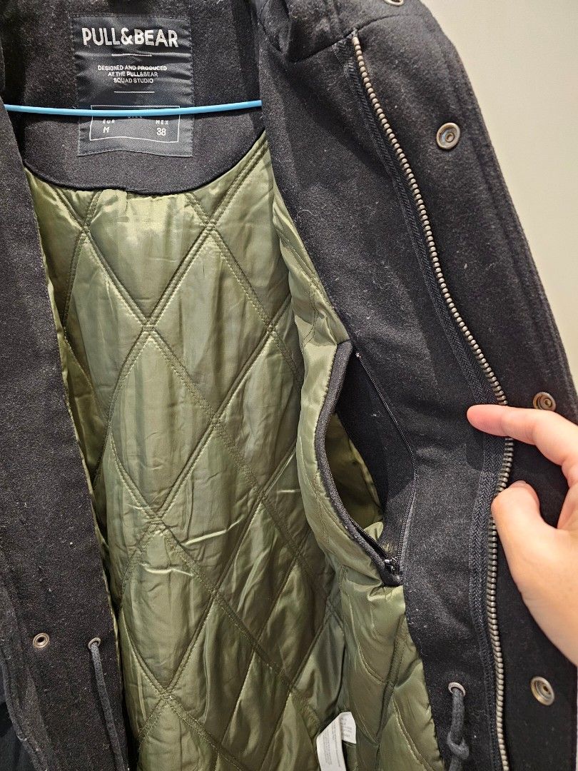 Pull & Bear winter jacket (Category: Coats, Jackets and Outerwear) located in Singapore. Submitted by ktanb (Listing ID 1269548714, Image 4). Description: Pull & Bear winter jacket. Size Eur M/Mex38. Made from 51% wool, rest of material as shown in picture. Jacket is in very good condition. Very well made and solid jacket. With hood. Quite water repellant, used it in light drizzle no issues. This jacket has been used in Iceland, with thermal inne