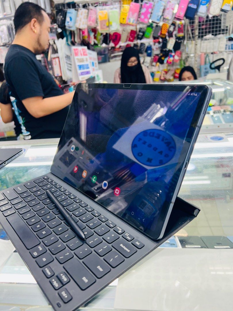 Samsung Tab S7 FE (Category: Android) located in San Juan City. Submitted by javedsgadgetshop (Listing ID 1269485005, Image 2). Description: OPEN FOR INSTALLMENT VIA CREDIT CARD/GGIVES & SWAP/TRADE-IN! WE BUY AND SELL ( ANYKINDS OF UNIT BINIBILI PO NAMIN)! PTPA : Padelete po f bawal Read ❗️Onhand ‼️ Samsung Tab S7 FE •128gb •NTC Variant •Good batt health •Factory Unlock •95% Smoothness •No hidden issue | No Repaired •100% Authentic | Not Refurbis