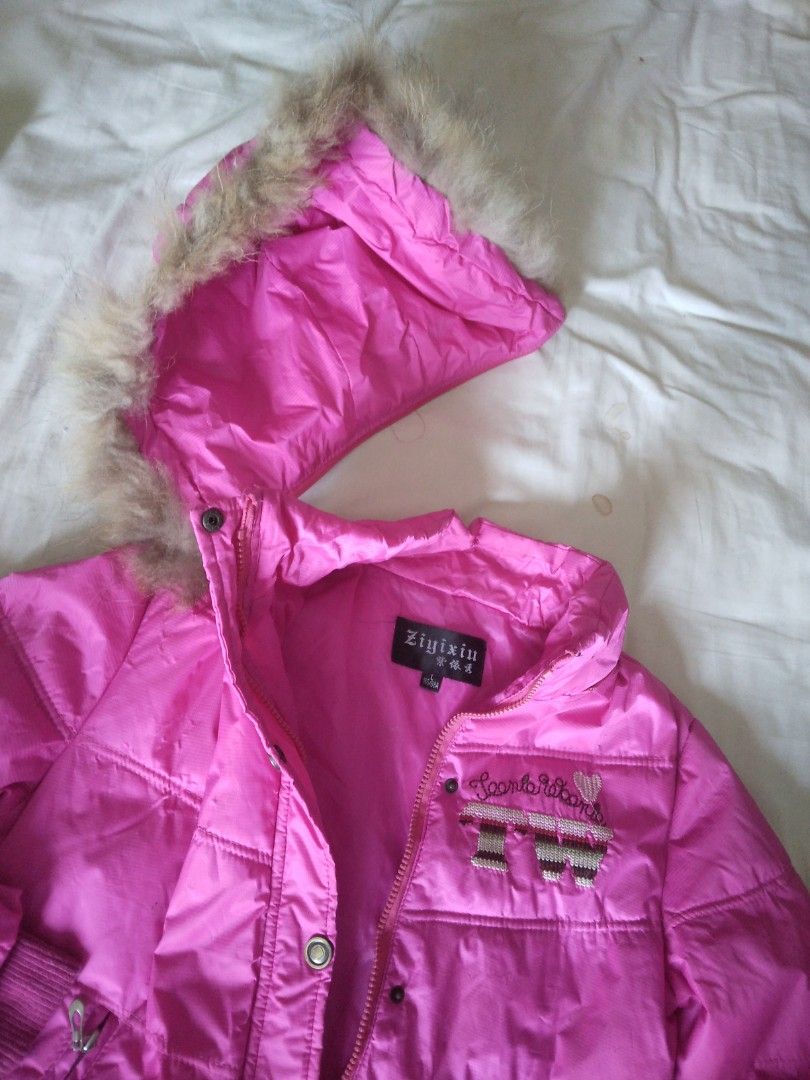 Winter jacket (Category: Babies & Kids Fashion) located in Petaling Jaya. Submitted by pepper58 (Listing ID 1269498807, Image 3). Description: Fuschia pink winter jacket. size L . fits ages from 8-12 or XS ladies. detachable furlined hoodie, Measurements pit 18inches, length 22inches, sleeves 25inches.