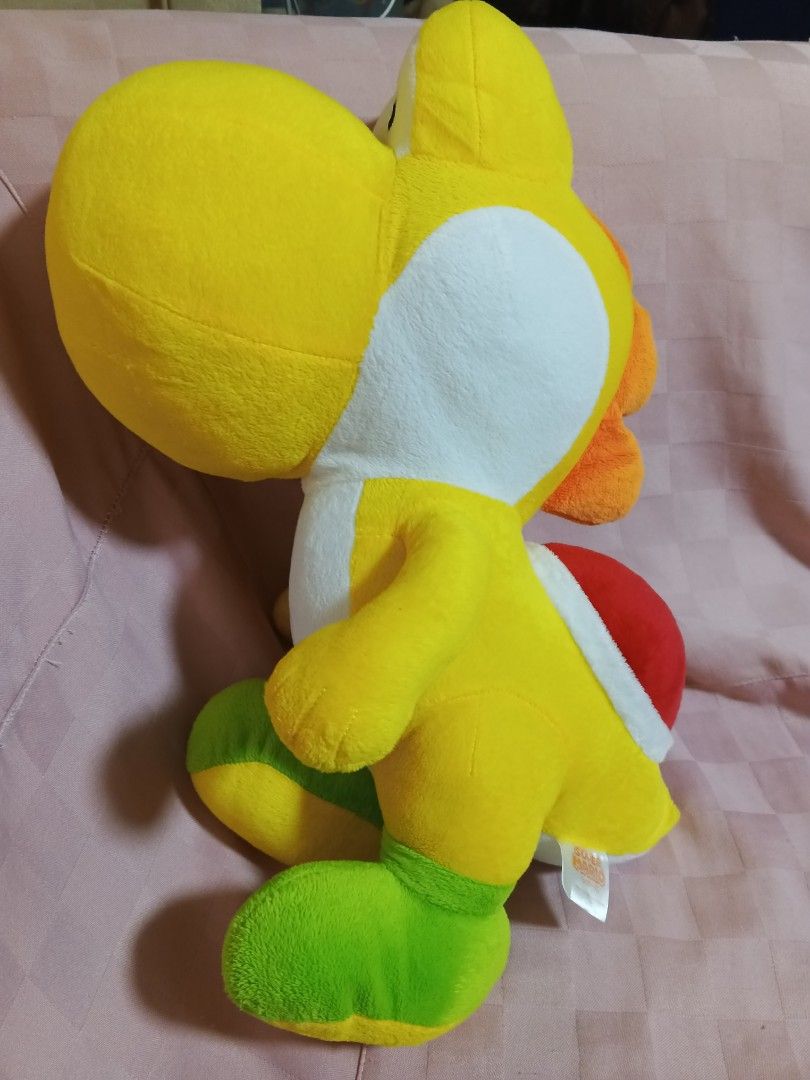 Yellow Yoshi Plushy 17 inches (Category: Plushies & Soft Toys) located in Cainta. Submitted by tipidmode2023 (Listing ID 1269563718, Image 2). Description: selling this yellow yoshi plush. size 17 inches. maker is TAITO japan. rfs: helping my nephew raise funds for his new artwork and teaching him to do side hustle..