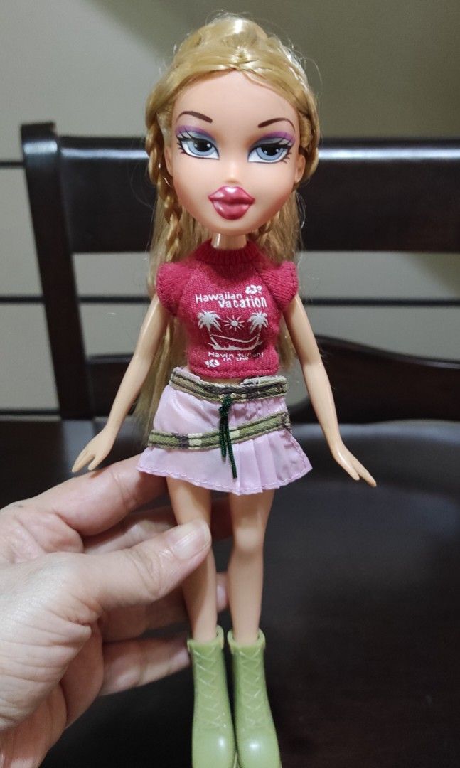 Bratz Cloe Funk Out Doll (Category: Kids Toys) located in Bacoor. Submitted by collectors_haul (Listing ID 1269797303, Image 1). Description: ✨ Slightly loose neck joint. ✨No stain. ✨Frizzy hair. ✨Wearing Sasha's Funk Out skirt and shoes and Yasmin's Sun-Kissed Summer top. ✨Outfit needs to be washed. ✨I have no idea if she has cut hair. Pacheck na lang po. ✨Please see pictures carefully for hair condition or ask for more if needed. ✨What you see 
