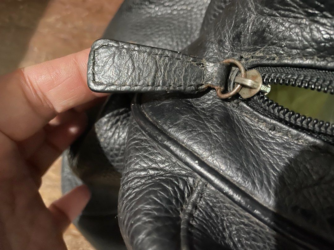 CMG leather bag (Category: Luxury Bags & Wallets) located in Cainta. Submitted by jayds (Listing ID 1269822681, Image 2). Description: CMG leather bag * very roomy inside * has 3 inside pockets, 1 of which is zippered * bought in 2006 for almost Php18k in Celine Mixed Group in Robinsons Galleria (no longer open) * this has served me well for sleepovers and even weekend out of towns * i can provide the original paperbag * no dustbag included but a