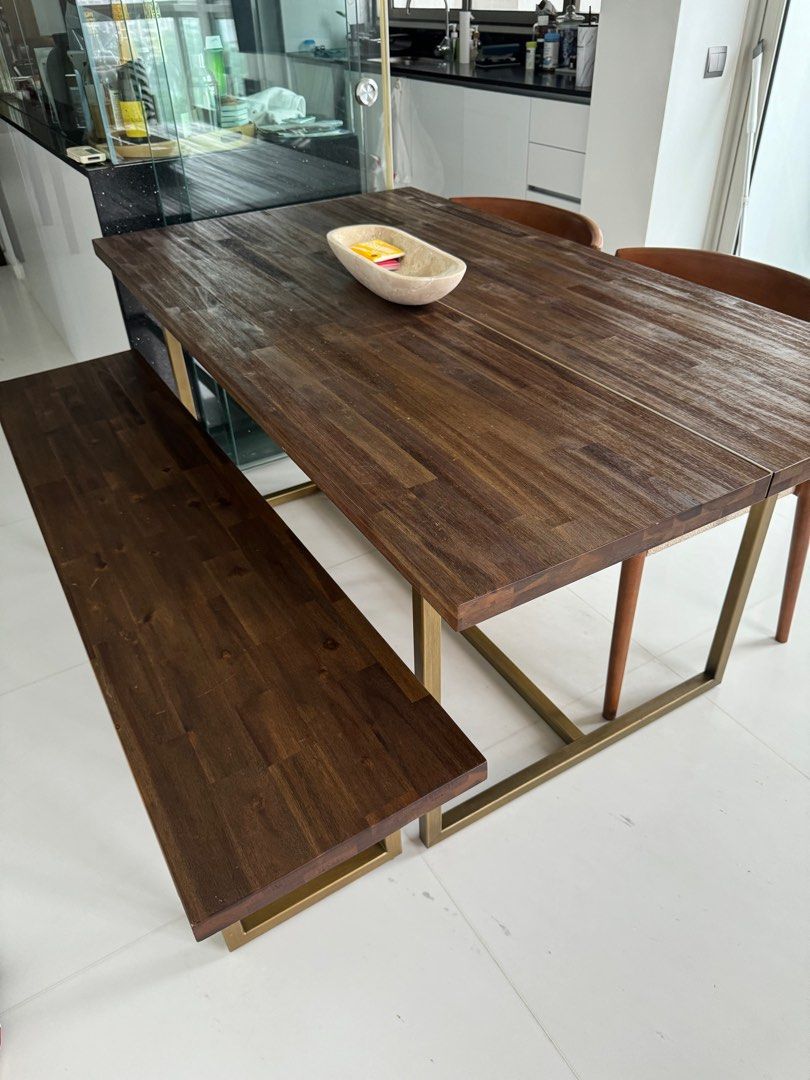 Dining Table Set (Category: Tables & Sets) located in Singapore. Submitted by heyimbelly (Listing ID 1269767758, Image 1). Description: Bought in Aug / Sept 2022 from castlery close to $2000 for full set, and bench and table model are no longer in stock. Beautiful rich solid wood and brass finishing. Chairs were added to complete the dining set. Letting go at $800 for whole set. PM to discuss .