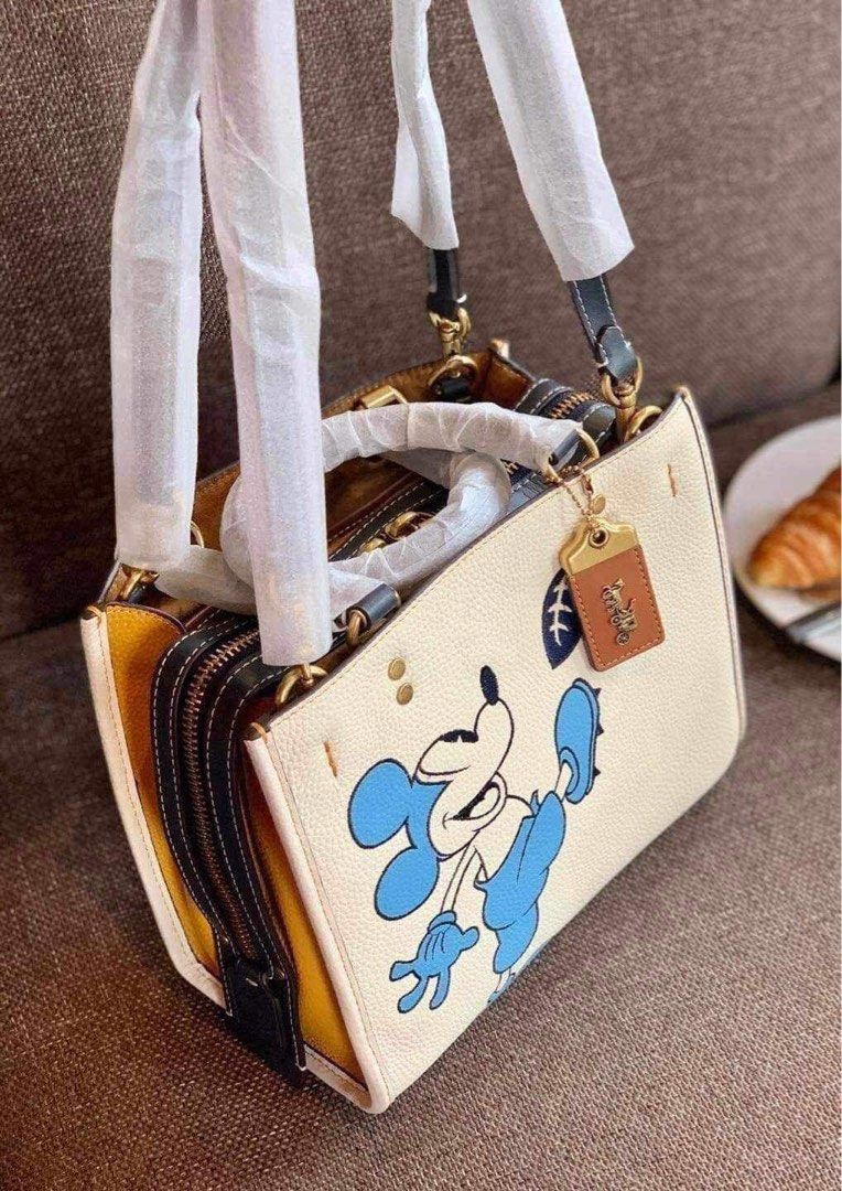 DISNEY × COACH Rogue 25 w/ Mickey Mouse (Category: Cross-body Bags) located in Rizal. Submitted by LuxbyMarifrance (Listing ID 1269896828, Image 2). Description: 🏷️ 3,800 only + SF 💼 DISNEY × COACH Rogue 25 w/ Mickey Mouse 📏 31cm (L) × 25cm (H) × 15cm (W) 📌 with dust bag and paper bag ✨All trademarks, logos and brand names are reserved and property of the original brand owners. #coachph #authenticqualitybagsph #authenticqualitybags #lowestpri