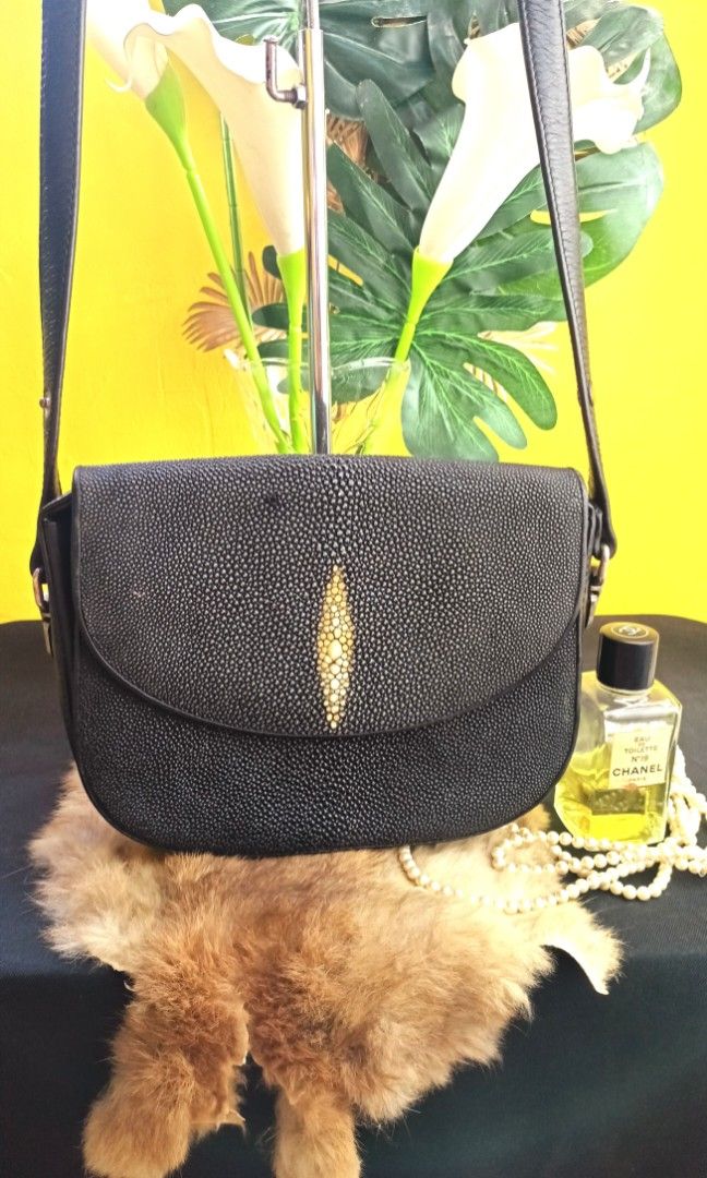 Genuine stingray leather sling bag from japan (Category: Luxury Bags & Wallets) located in Manila. Submitted by osaze_27japanbags (Listing ID 1269704689, Image 1). Description: Genuine stingray leather sling bag🇯🇵 ang leather na maswerte🥰 no flaws,minimal sign of wear only grabe sa leather ito,sobrang tibay pm na po,madam ko.
