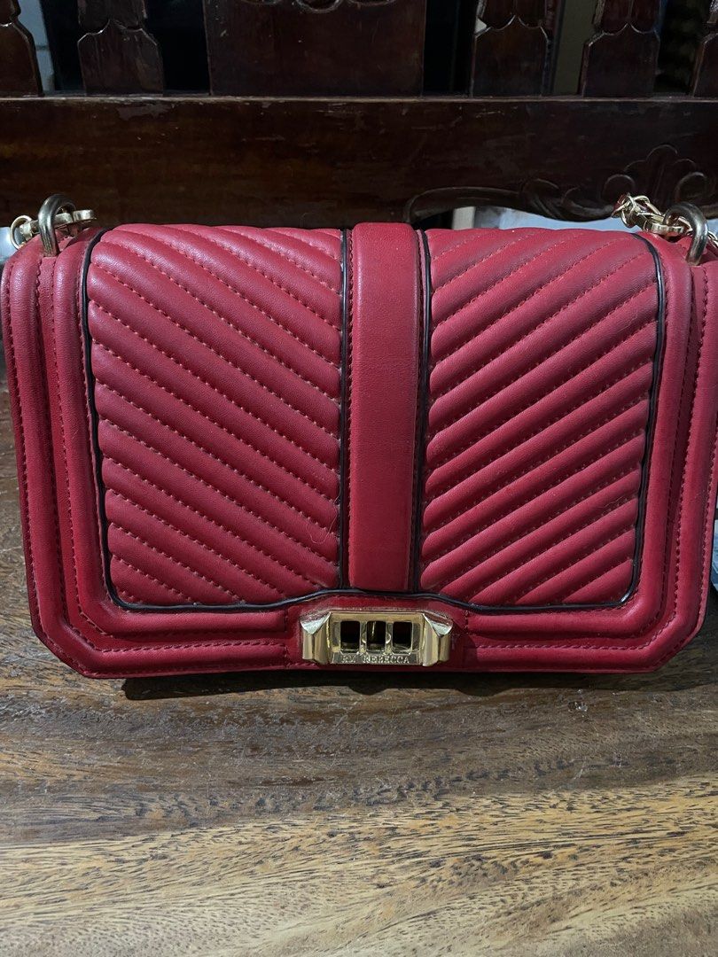 Rebecca Minkoff Chevron leather bag (Category: Cross-body Bags) located in Cainta. Submitted by jayds (Listing ID 1269830703, Image 2). Description: Rebecca Minkoff Chevron leather bag * has 4 inside pockets, 1 of which is zippered * 1 pocket at the back * bought for almost Php17k in Rustans * only used once for an event * no dustbag included but all my bags are kept inside a dustbag and is inside a room that has dehumidifier * bag is well kept b