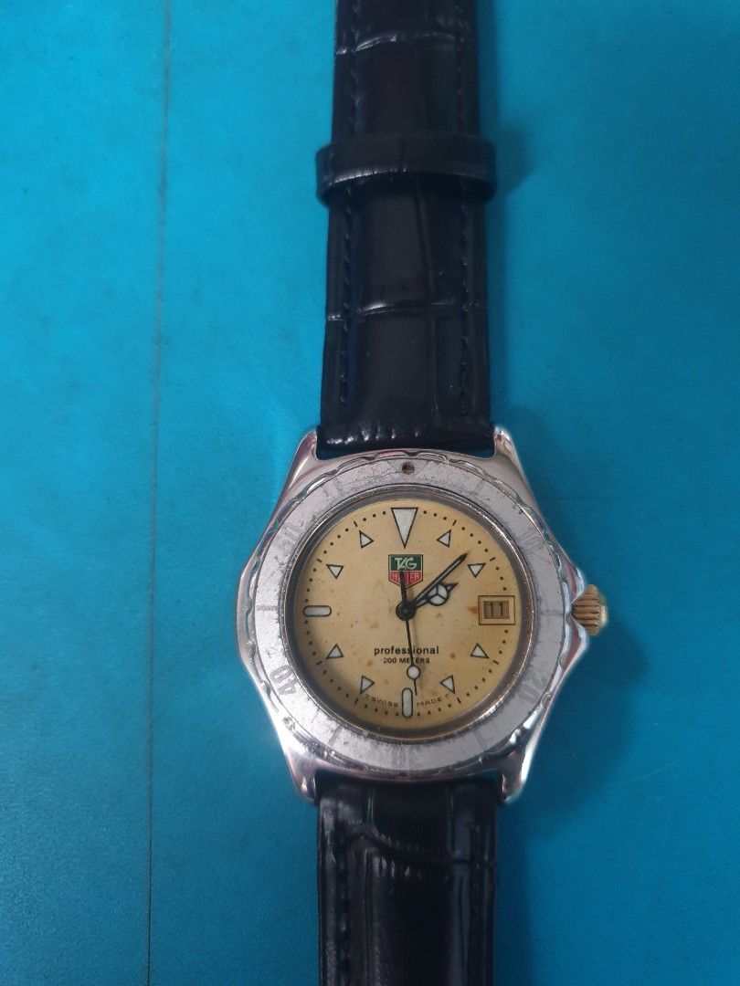 Tag heuer Vintage (Category: Luxury Watches) located in Naga. Submitted by xkenzero7x (Listing ID 1269884497, Image 2). Description: Rush! 6.5k (freeship) pwedi COD/Cash on Delivery pag malayo via LBC Vintage Tag heuer -Swiss Quartz movement -Professional 200meters -Screw down crown -Medium size (Unisex) -New Battery -New Black Leather strap -Very Good condition Issue: my kunting chip/tapyas sa crown nya pero pag na lock ung crown nya d halata ka