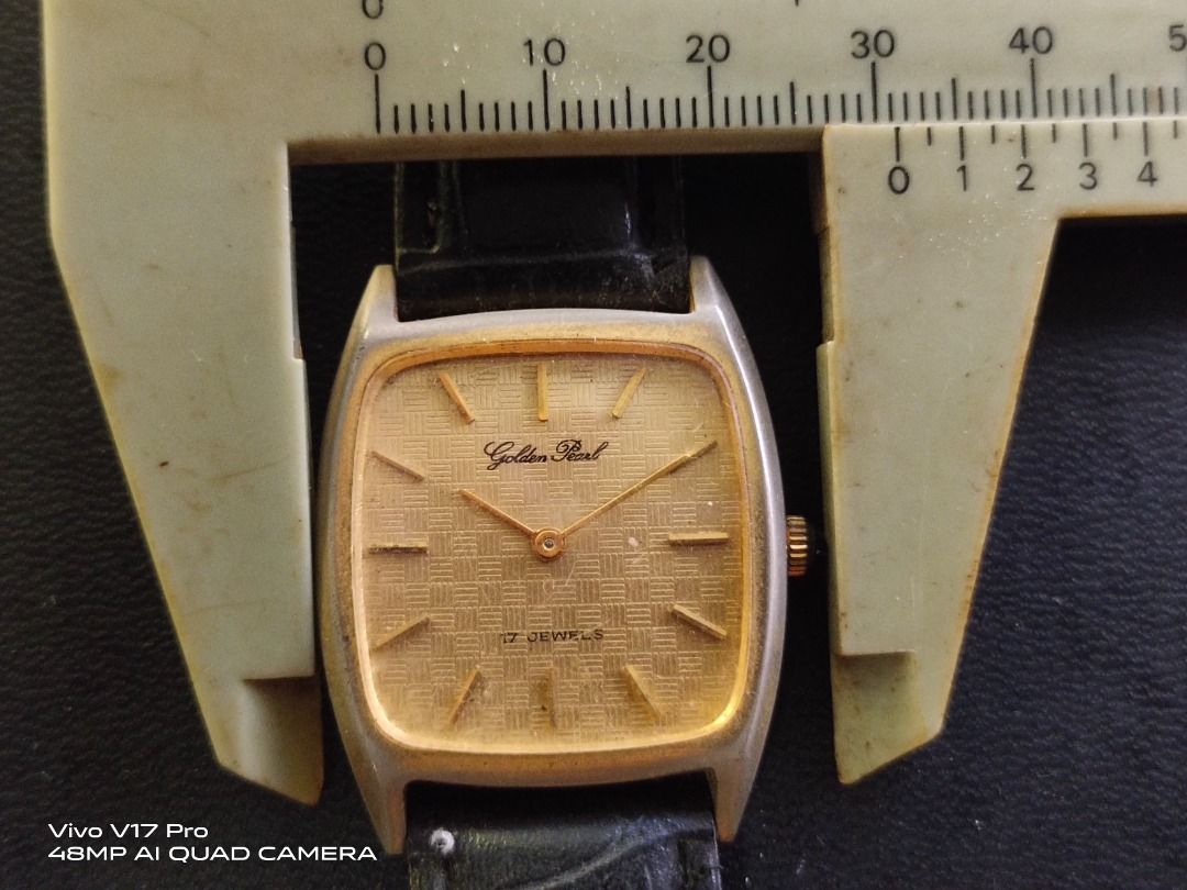 Golden online pearl watch