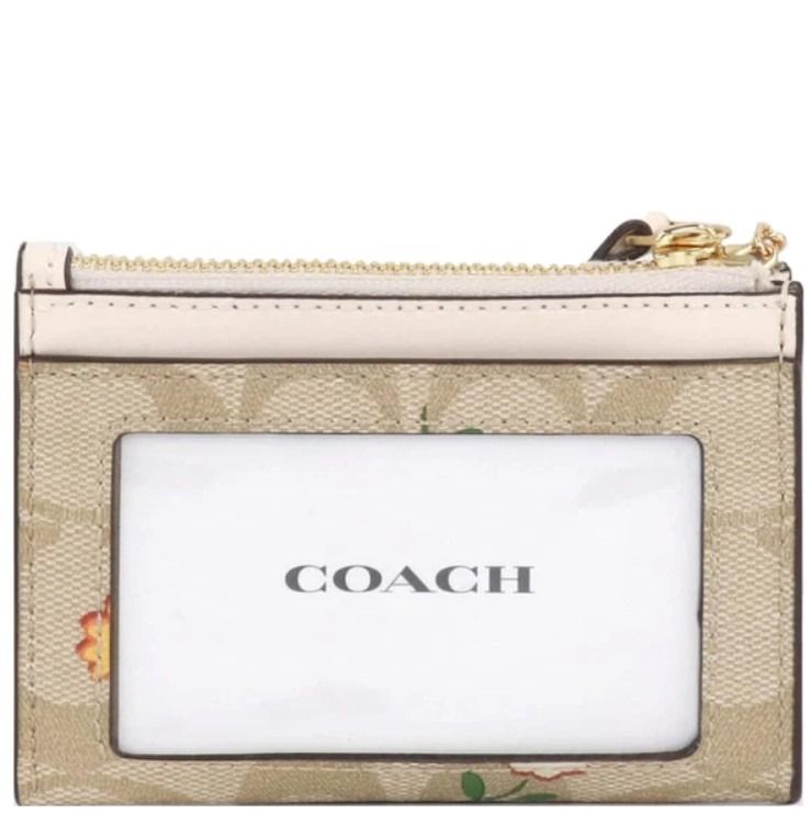 Boxed xl mini skinny id case and 2025 picture bag charm set in signature canvas