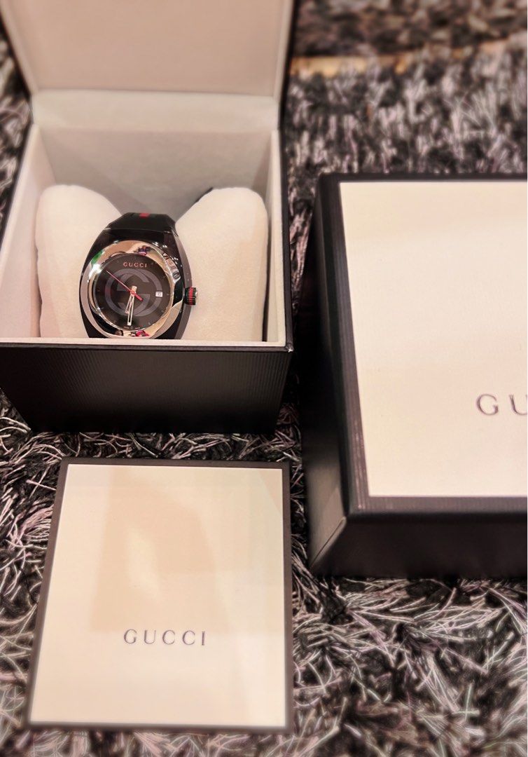 Authentic Gucci Unisex Watch (Category: Luxury Watches) located in San Fernando. Submitted by authenticsph (Listing ID 1270074157, Image 2). Description: Gucci Watch Guaranteed Authentic From US 🇺🇸 36mm case; 18mm band width. Buckle closure; adjustable strap. Swiss quartz movement. Date function. Mineral crystal face. Nylon/rubber/stainless steel. By Gucci; Swiss made..
