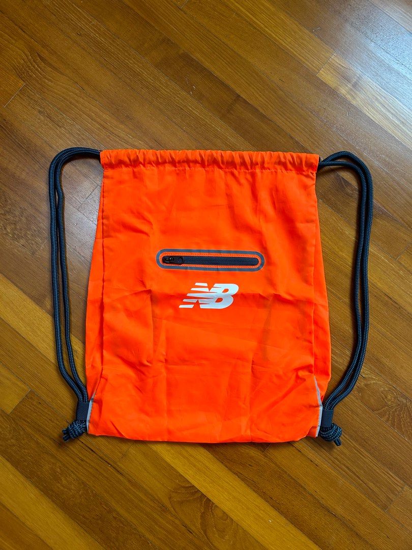 New balance drawstring bag top