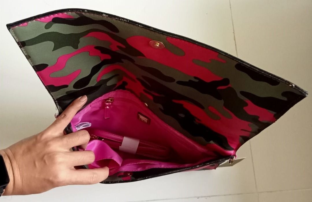Carpisa clutch sales bag