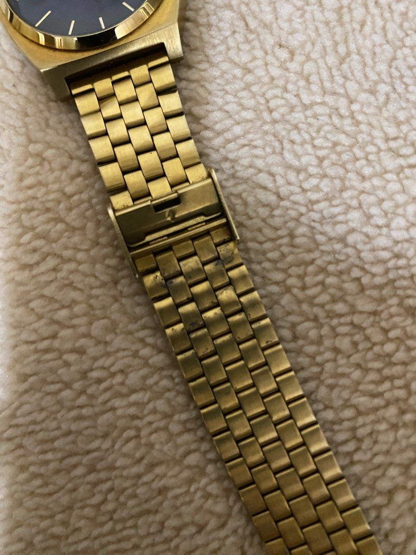 Nixon time teller deals gold black sunray