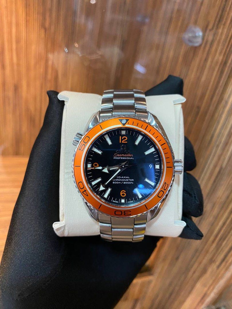 Planet ocean cheap orange bezel