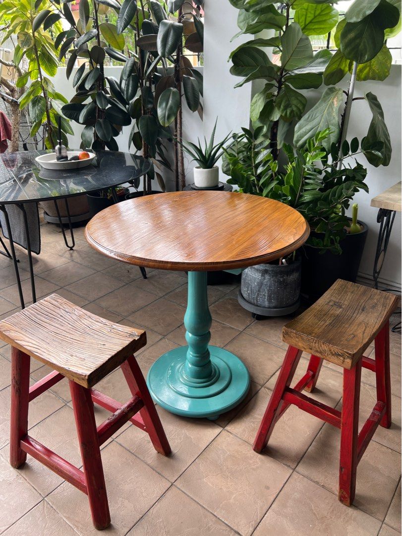 Solid Elm Timber Round Table (Category: Tables & Sets) located in Singapore. Submitted by tokogarasi (Listing ID 1269987784, Image 1). Description: RETRO-MODERN HANDCRAFTED ELM TIMBER TABLE! Beautifully custom designed and made using flawless superior grade solid Elm wood table top, matched with funky Tiffany-teal or retro-red colored leg, decorated with vintage profiles for an interesting twist that will always be a conversational topic for your