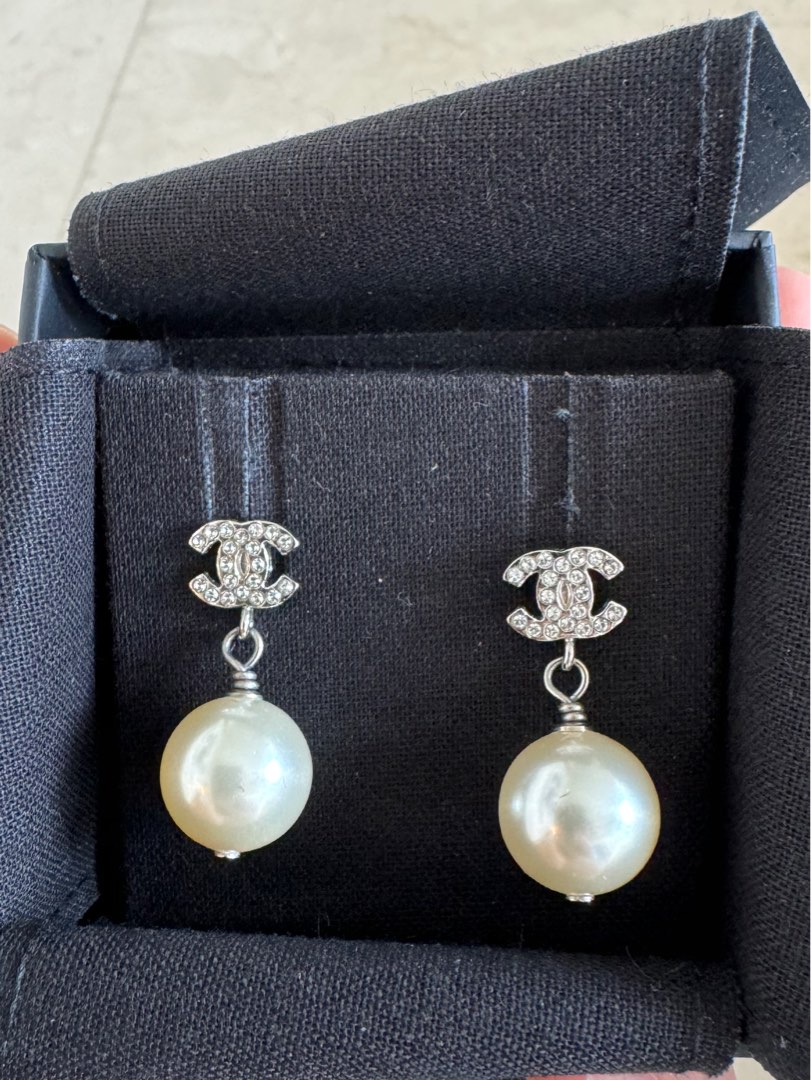 Chanel pearl hotsell earrings price