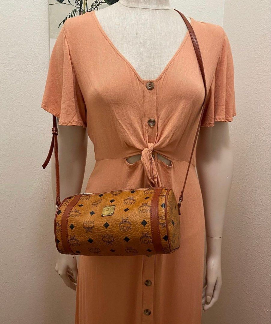 MCM crossbody bag (Category: Luxury Bags & Wallets) located in Paranaque City. Submitted by jenniferj97672 (Listing ID 1270242647, Image 2). Description: MCM crossbody bag 9000.00 Color: brown 🤎 Material : PVC Leather Size(cm) : W24cm x H13cm x D12cm(Approx) Size(inch) : W9.4 x H5.1 x D4.7inch(Approx) Condition: Very good ✨ Seller’s note: “clean in and out” Disclaimer: All items are original, luxury pre-owned items. Money back guarantee if prove